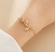 Gold Rose Stem Bracelet – Elegant Minimal Jewelry