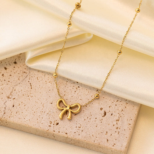 Golden Bow Pendant