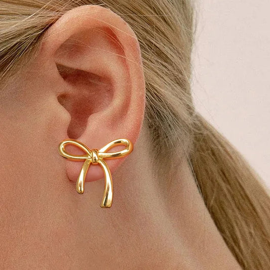 Dainty Gold Bow Studs – Minimal & Elegant