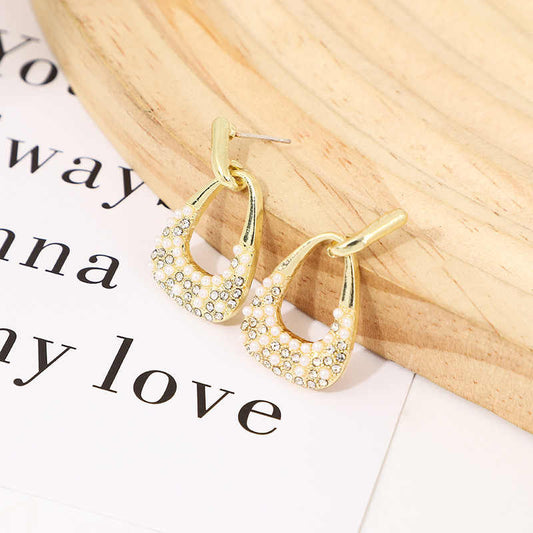 Luna Cascade – Pearl-Drenched Drop Earrings