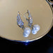 Celestial Pearl Wing Earrings