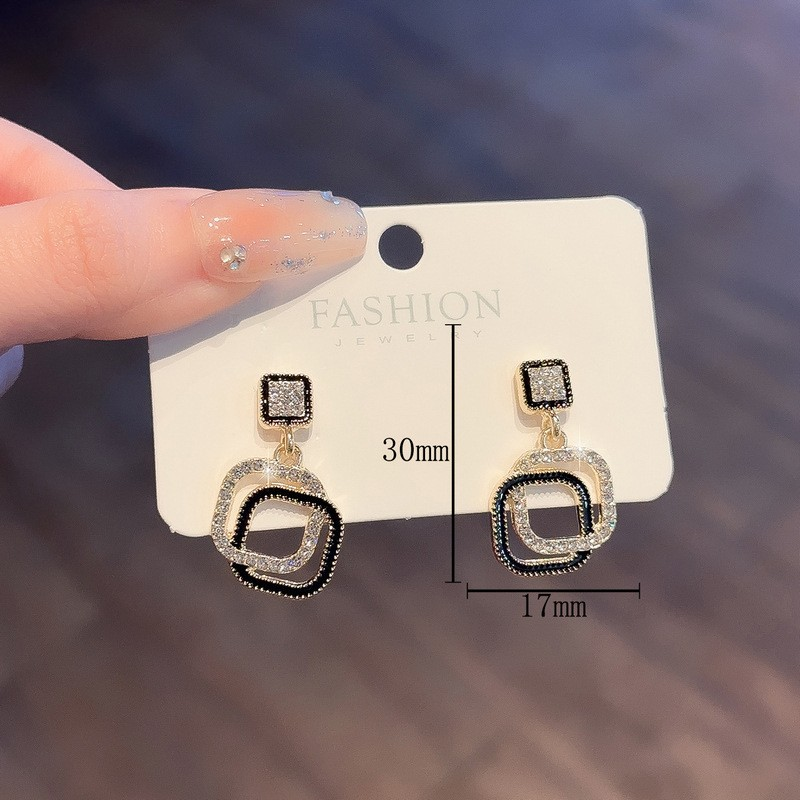 Gilded Noir Crystal Drop Earrings