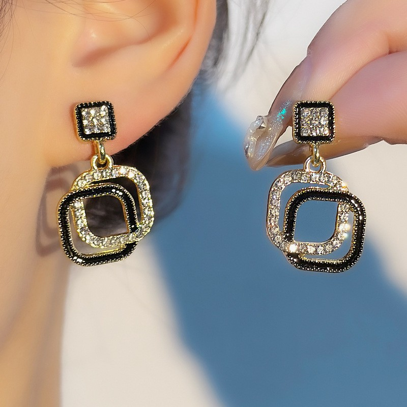 Gilded Noir Crystal Drop Earrings